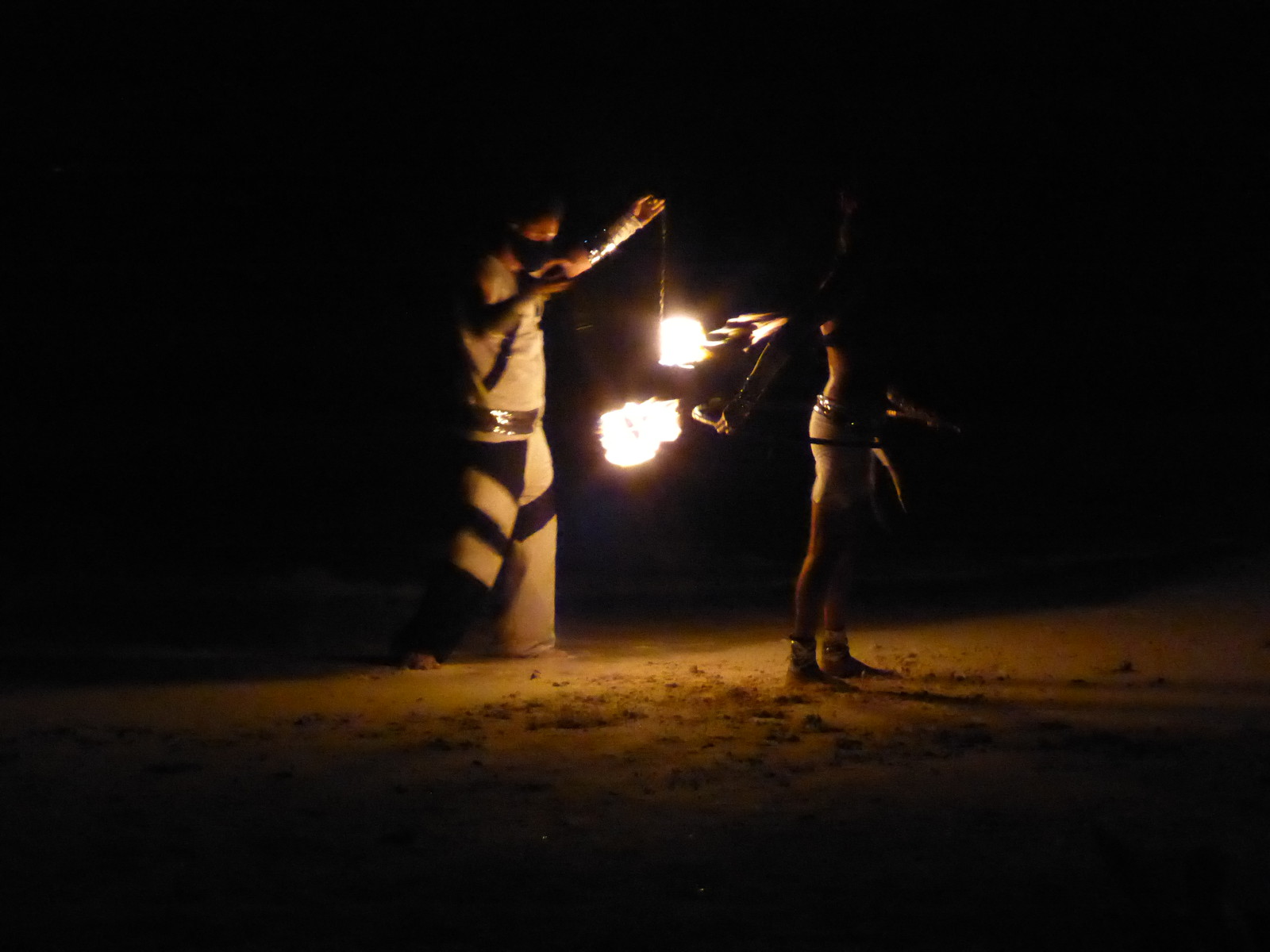 Fire juggling on the beach at Fusion