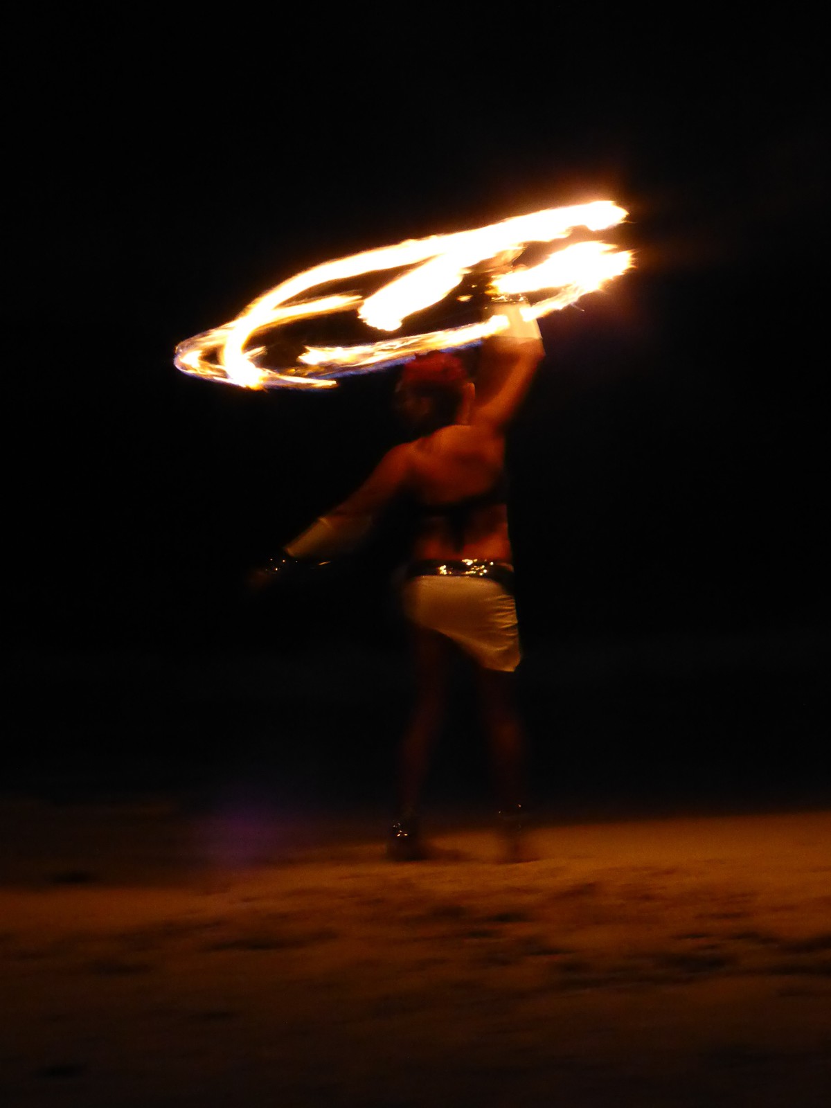 Fire juggling on the beach at Fusion