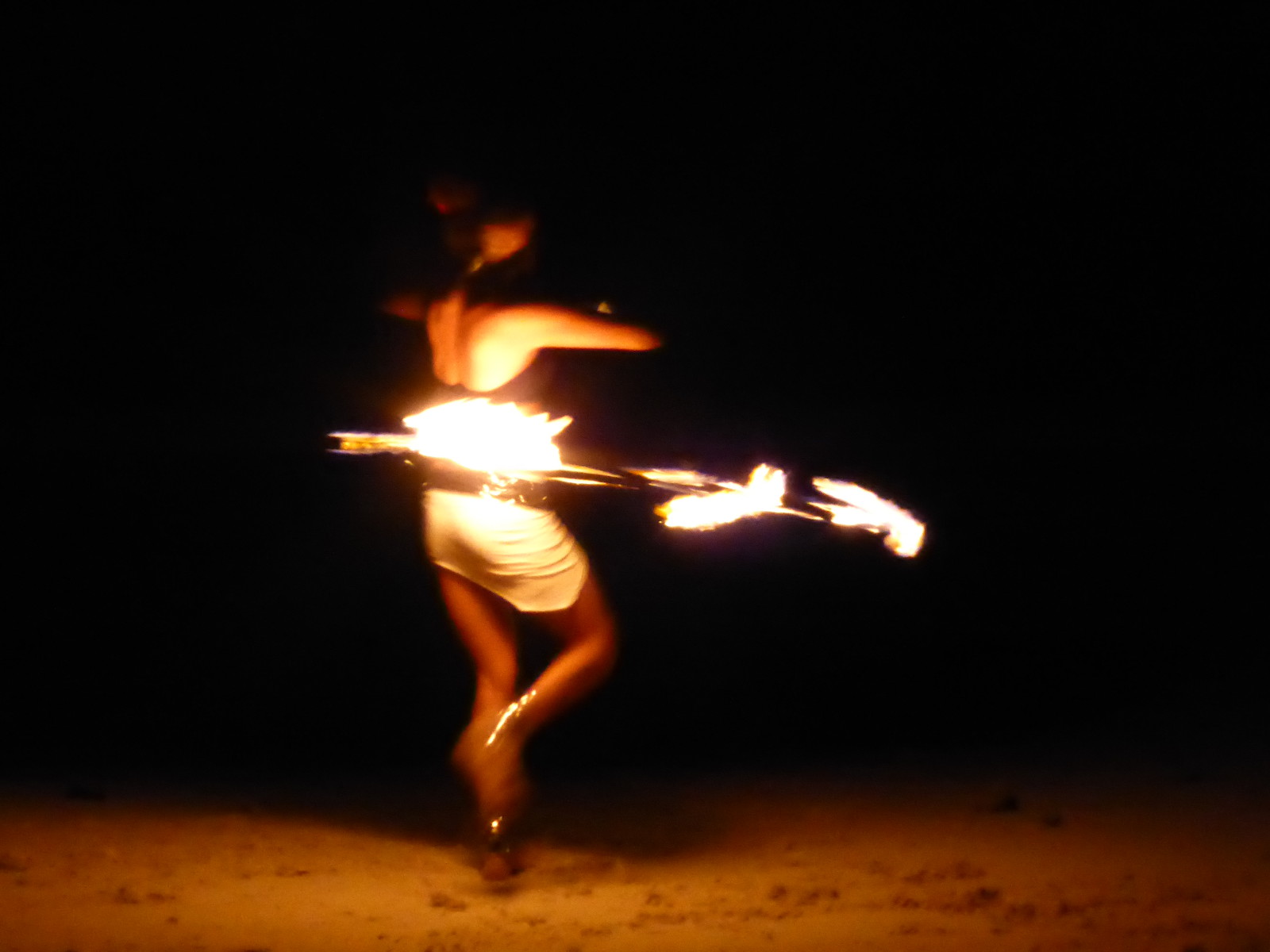 Fire juggling on the beach at Fusion