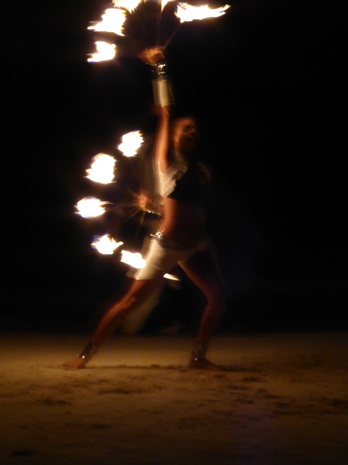 Fire juggling on the beach at Fusion